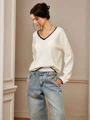 Top tricot brodé épaule drapée