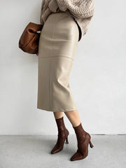 Jupe midi simili cuir passepoil