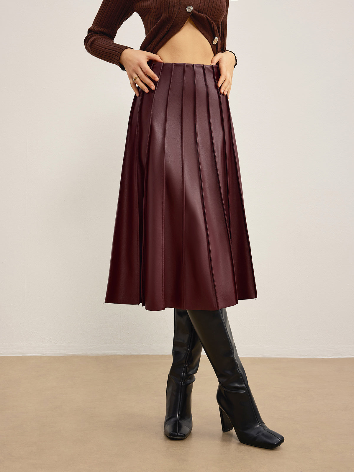 Jupe midi plissée simili cuir