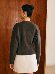 Pull boutonné fendu