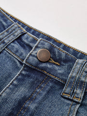 Jean bootcut taille médiane bleu, détail du bouton