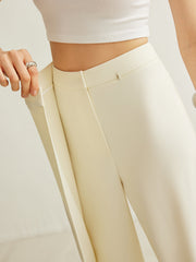 Pantalon portefeuille taille haute ivoire, détail du panneau
