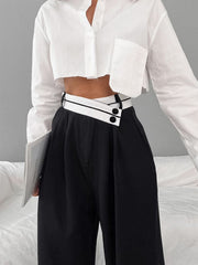 Pantalon ample à taille contrastée noir, détail de la taille