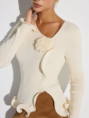 Top tricot fleuri bordure volantée