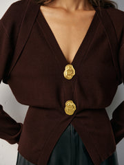 Pull col V détails métalliques
