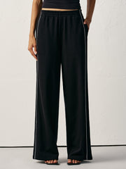 Pantalon de jogging à bande noir, vue portée de face