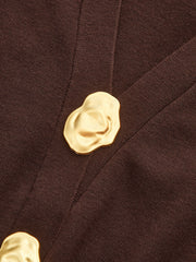 Pull col V détails métalliques