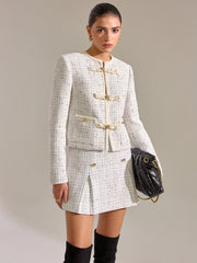 Jupe mini plissée tweed boutons métal