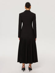 Manteau noir à ourlet plissé