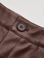 Pantalon ballon à panneau simili brun, détail du panneau