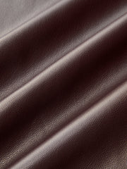 Pantalon simili cuir marron, détail du tissu