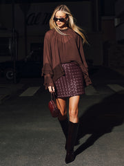 Jupe mini simili cuir tressée