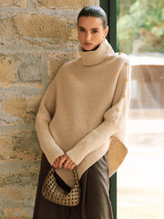 Poncho col roulé détail métallique