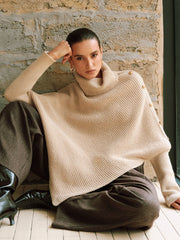 Poncho col roulé détail métallique