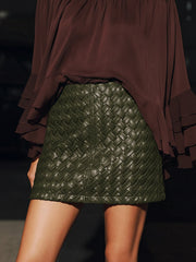 Jupe mini simili cuir tressée