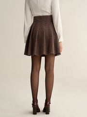 Jupe mini plissée taille haute pied-de-poule