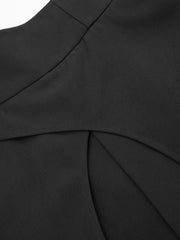 Pantalon noir taille haute asymétrique, détail de la taille