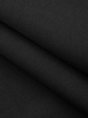 Pantalon noir taille haute asymétrique, détail du tissu