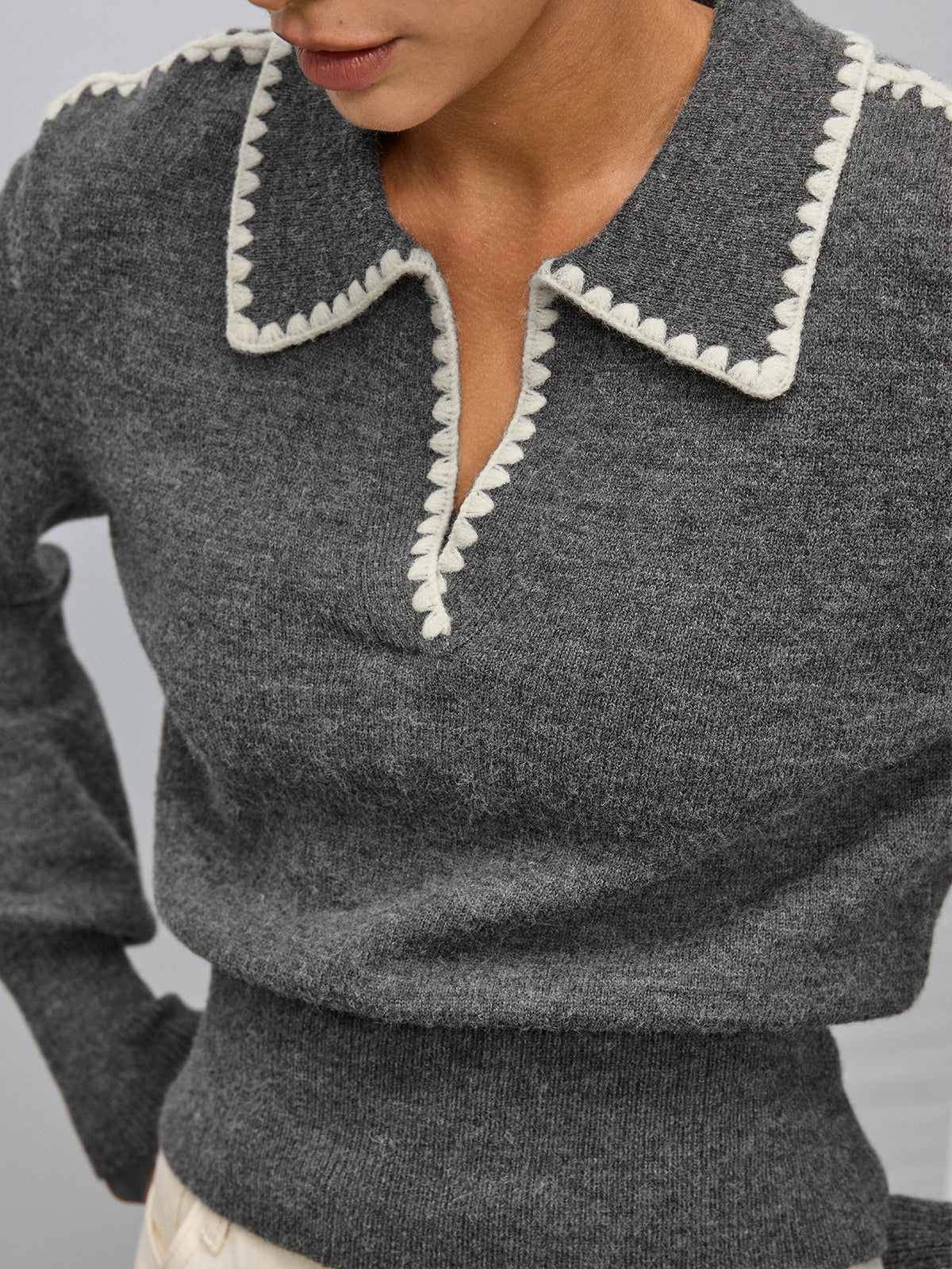 Pull polo bords brodés contrastants