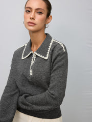 Pull polo bords brodés contrastants