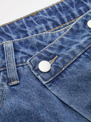 Jean asymétrique à jambes larges bleu, détail de la taille