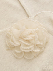Top tricot fleuri bordure volantée