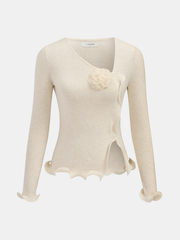 Top tricot fleuri bordure volantée