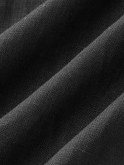 Pantalon noir brodé côté, détail du tissu