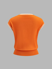 Top tricot bordure contrastée orange — vue de dos