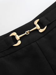 Pantalon ample à mors métallique noir, détail du mors