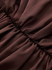 Pantalon ballon chocolat à ceinture, détail de la taille