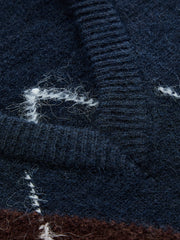 Pull sans manches col V losanges
