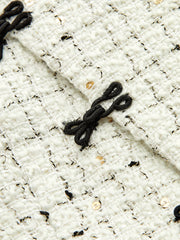 Blazer tweed à grenouillère