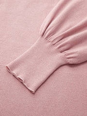 Pull col nœud laine
