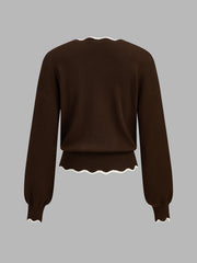 Pull laine bord festonné contrasté