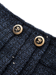 Jupe short plissée tweed