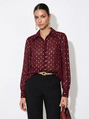 Chemise semi-transparente à pois dorés