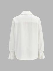 Chemise boutonnée poignets plissés