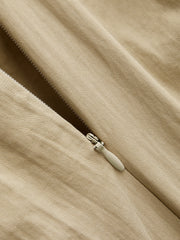 Pantalon large à nœud beige, détail, fermeture