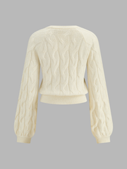 Pull torsadé col rond