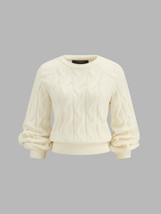 Pull torsadé col rond
