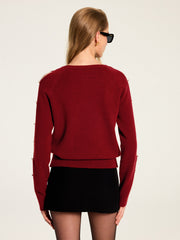 Pull nœud manches découpées