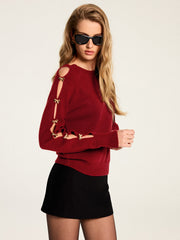 Pull nœud manches découpées