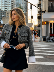 Veste tweed crop à poignets blancs