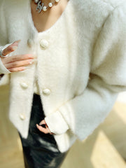 Manteau court laine bouclée