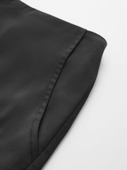 Pantalon satin noir dos élastique, détail de la poche