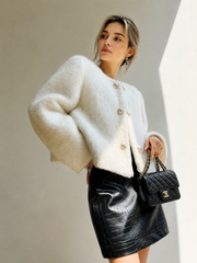 Manteau court laine bouclée