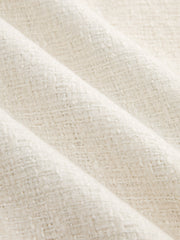 Pantalon tweed ivoire à boutons, détail du tweed