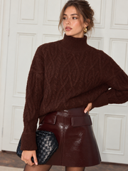 Pull torsadé à col roulé
