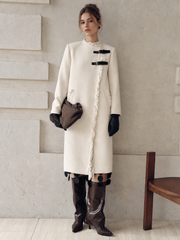 Manteau long à franges